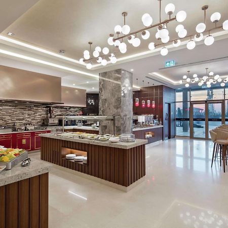 Отель Doubletree By Hilton Скопье Экстерьер фото The Kitchen Table