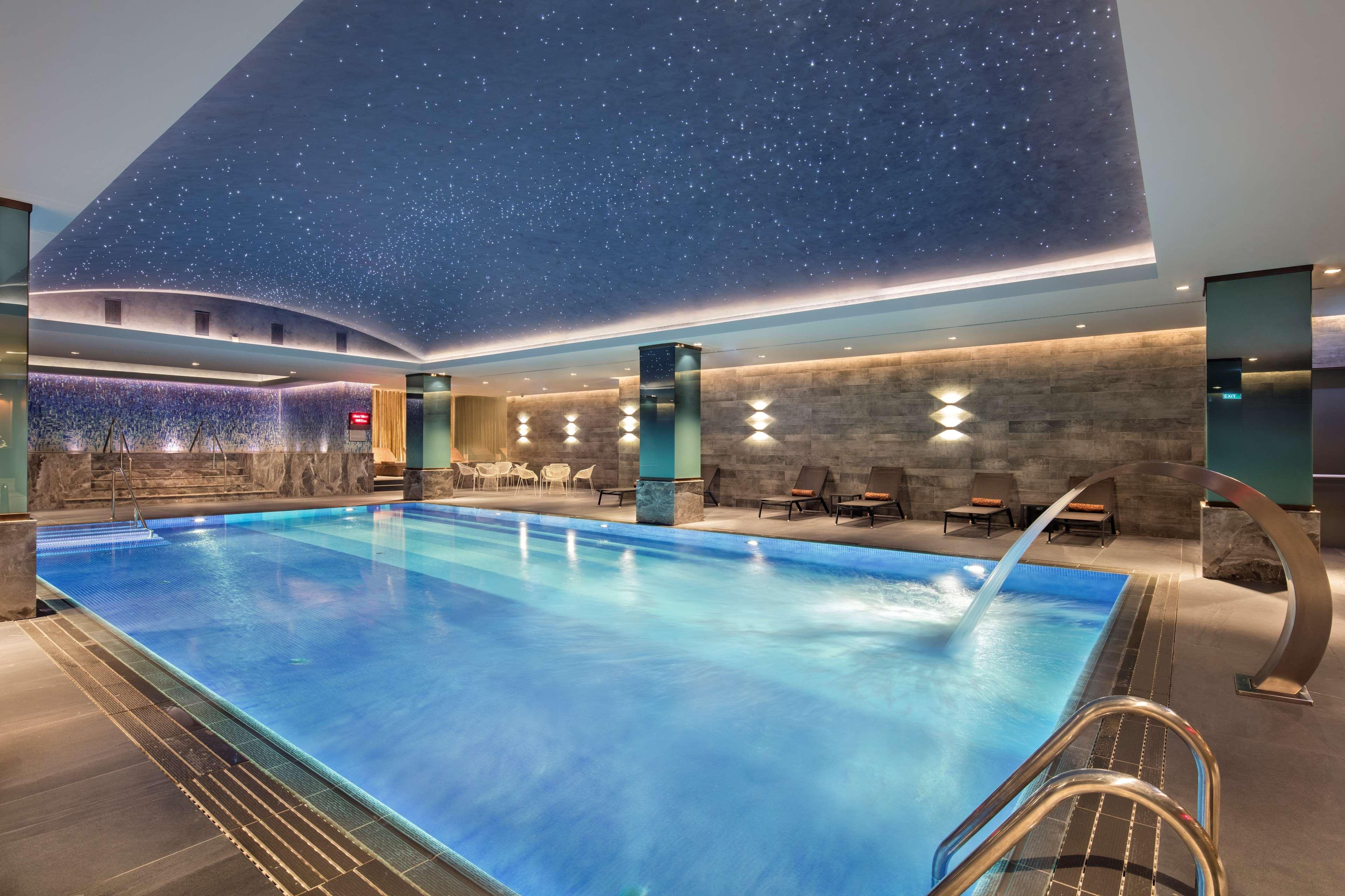 Отель Doubletree By Hilton Скопье Экстерьер фото The pool at the hotel