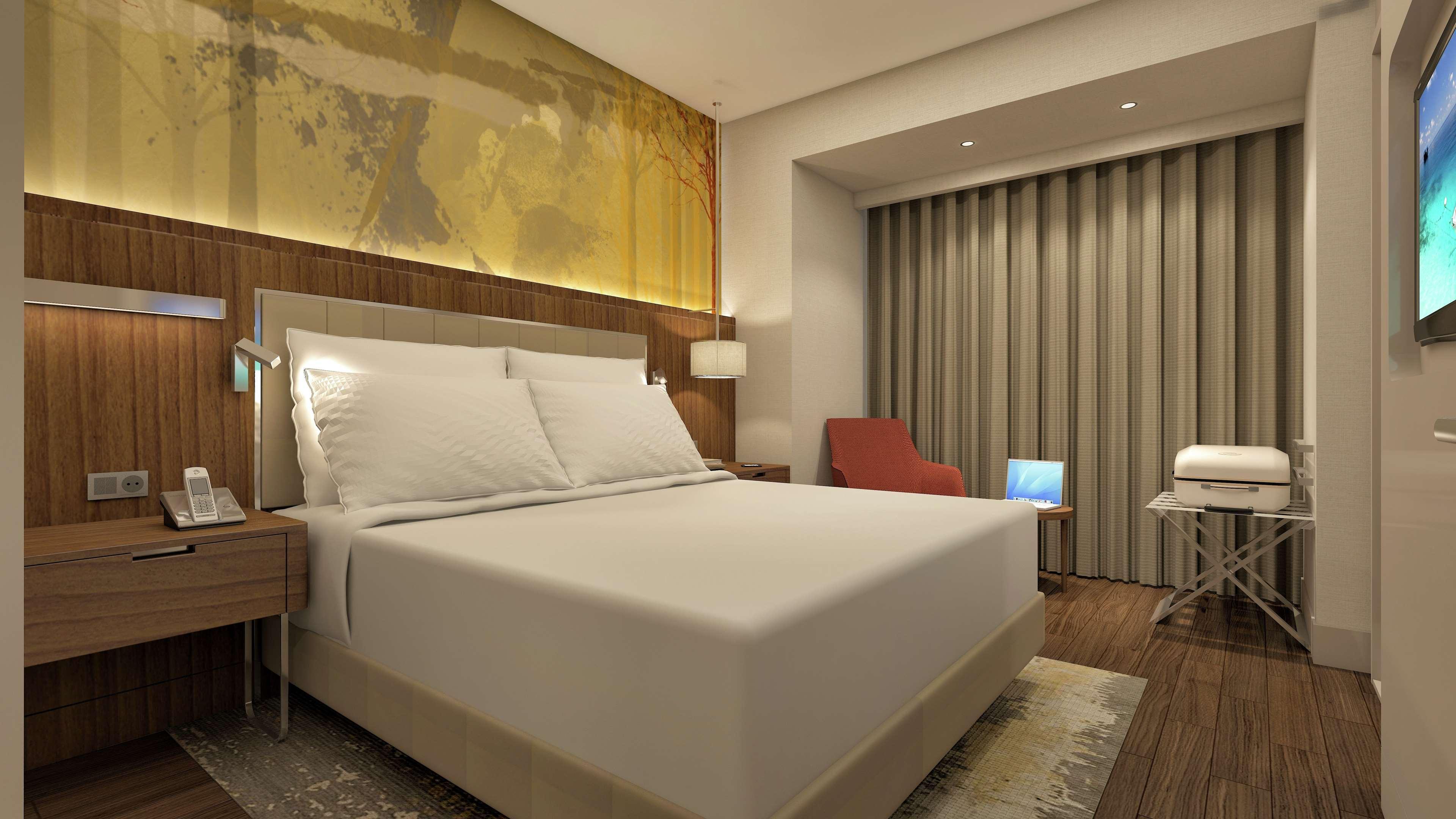 Отель Doubletree By Hilton Скопье Экстерьер фото A room at the hotel