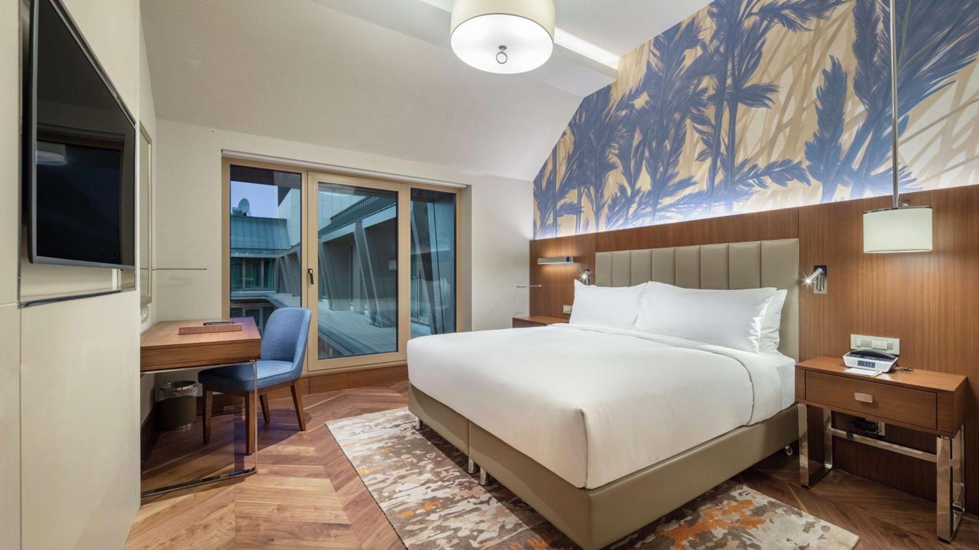 Отель Doubletree By Hilton Скопье Экстерьер фото A bedroom at the hotel